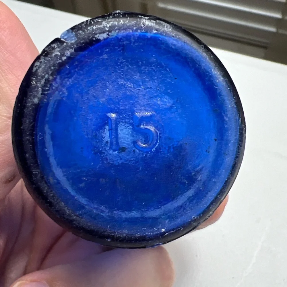 Lot of 4 vintage Colbalt Blue Glass Bottles